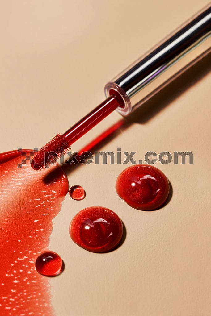 Red mascara with applicator brush image.