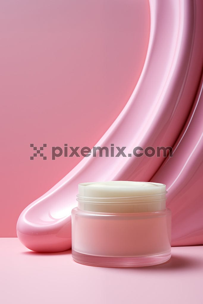 The image shows a cosmetic pink cream jar on pink background.